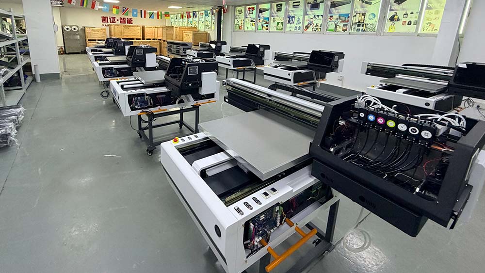 KAIOU UV printer factory with engineers assembling and testing UV printing machines.jpg KAIOU UV printer factory with engineers assembling and testing UV printing machines.jpg